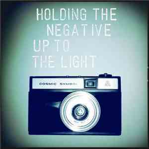 I am ampersand - Holding The Negative Up To The Light